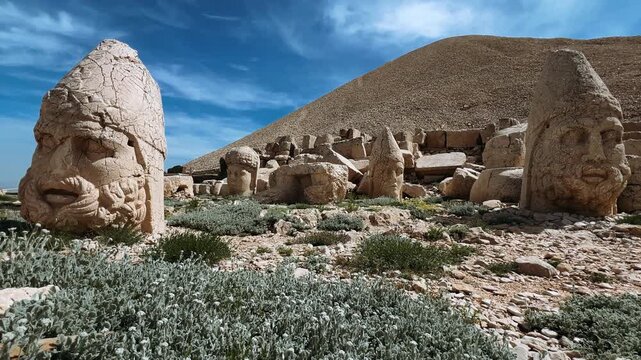 Turkey, Adiyaman, May 3, 2024: ruins at the top of Mount Nemrut. Destroyed ancient statues in the Taurus Mountains. Ancient stone heads on top of Mount Nemrut. 4К