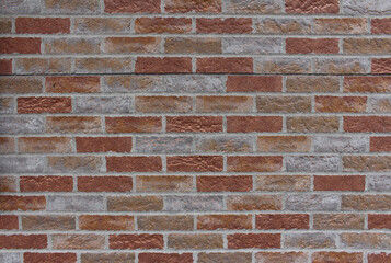 Obraz premium Close up of colorful brick wall texture background.