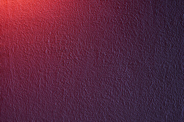 Fototapeta premium Rough painted wall with red to blue gradient, visible grain and dramatic color shift. Expressive abstract surface with strong contrast and tactile texture. Copy space