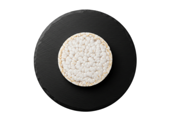 Rice Cake Crispbread on Round Black Slate Plate Top View