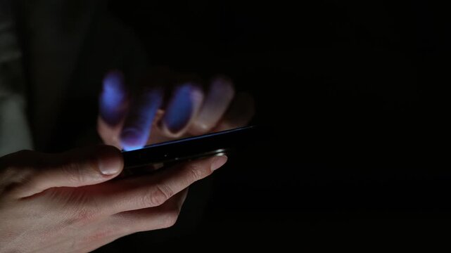 Mobile communications and online communication.
A person types a text message on a smartphone and sends it.
Scrolling through an online news feed.
Mobile communications and virtual communication