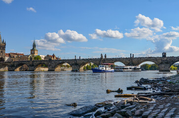 Czech Republic, Prague September 6, 2025, The Charles Bridge in Prague is undoubtedly one of the most popular bridges in Europe, and behind it, Prague Castle, towering over the Vltava River