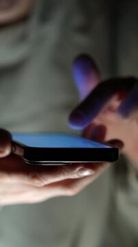 Mobile communications and online communication.
A person types a text message on a smartphone and sends it.
Scrolling through an online news feed.
Mobile communications and virtual communication