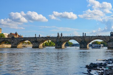 Czech Republic, Prague September 6, 2025, The Charles Bridge in Prague is undoubtedly one of the most popular bridges in Europe, and behind it, Prague Castle, towering over the Vltava River