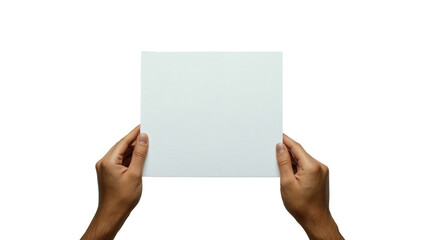 Fototapeta premium Hands holding a square of white paper in front of a plain white surface, with the fingers visible and no solid white background and no background