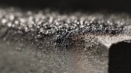 Detailed medium shot capturing the subtle contrast between fine and coarse aluminum grains emphasizing their impact on metal performance characteristics.