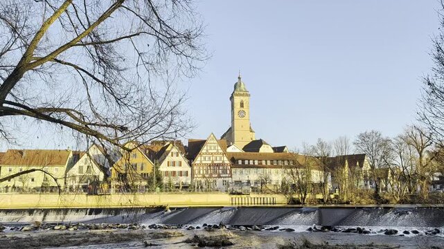 Old town and church on a river in europe