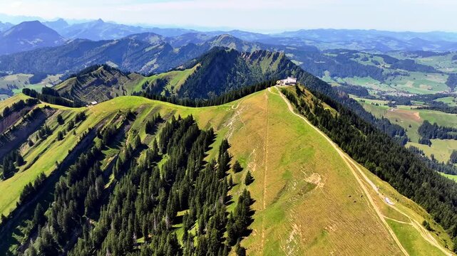 Aerial summer view of the Kronberg with cable car and panoramic alpine landscape