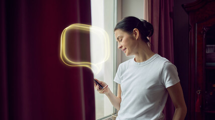 Woman using smartphone with virtual AI assistant chat interface at home. Concept of smart digital help, promo campaigns, app marketing, lifestyle technology ads, home services and mobile communication