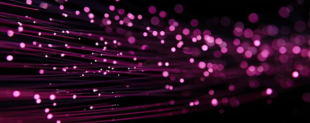 Abstract glowing pink light trails and bokeh on a dark background, flowing effect