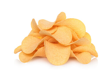 Potato chips heap on white background, snack food concept with natural reflection and shadows