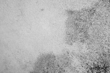 Photo of a dirty cement floor. Black and white stained concrete background
