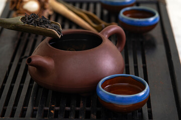 tea ceremony, close up of clay teapot and cups