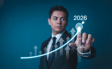 Businessman Pointing at Rising 2026 Growth Graph Target on Virtual Screen