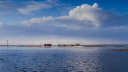 Submerged Lakeside Cabin on Qinghai Lake Bird Island, China