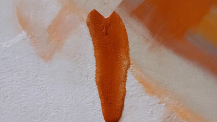 Satisfying paint drip on canvas capturing mesmerizing flow and texture