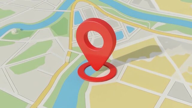 Aerial view of a map with a red location marker on a cityscape near a river