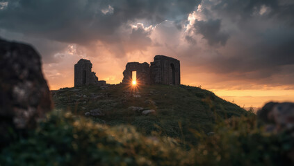 Ancient ruin sunrise ruins sunrise hill dramatic sky stone silhouette sunburst