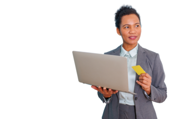 Black businesswoman holding laptop and credit card, thinking about online shopping and digital payment options