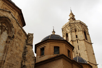 Tower of Valencia Cathedral in the historic old town, showcasing Gothic architecture and religious heritage, taken in July 2024.
