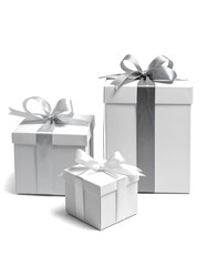 Three white gift boxes with silver ribbons