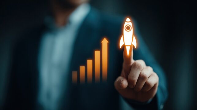 Business founder touches rising rocket hologram and orange growth chart conveying startup growth and innovation with confident gesture and blurred businessman background
