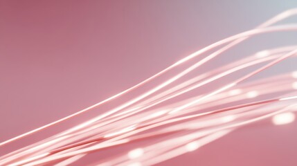 Abstract light trails in soft pink tones creating a dreamy and stylish background for modern design projects and artistic themes