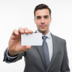 Businessman holding card isolated on white background
