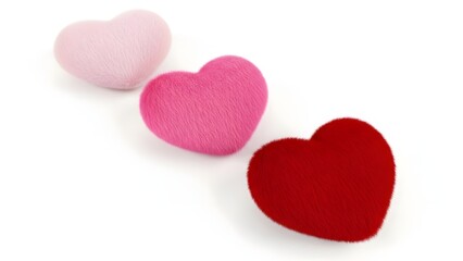 Fototapeta premium Three heart shaped crafts in pastel colors