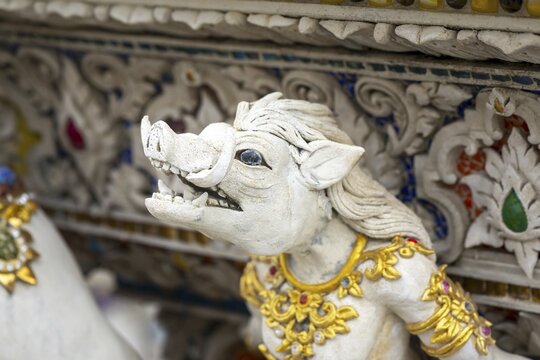 Decorative elements with pop culture references (for example comics, superheroes) in the stucco and porcelain vases outside and inside the art hall with modern art trends such as minimalism and abstraction, Wat Pariwat, Yan Nawa district, Bangkok, Thailand