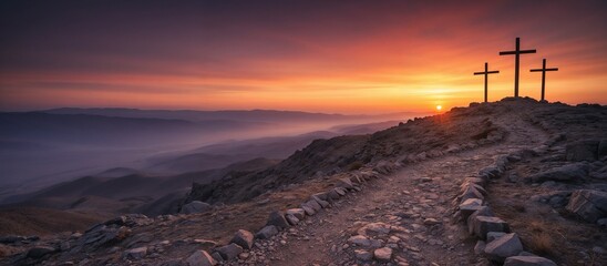Scenic mountain view with three crosses at sunrise surrounded by misty landscape. Crucifixion Of Jesus Christ At Sunrise - Three Crosses On Hill