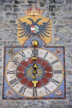 Colourful tower clock with coat of arms, Zw&ouml;lferturm, historic old town, Sterzing, South Tyrol, Italy