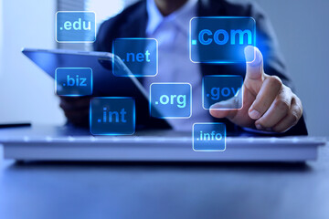Domain name concept with businessman touch on .com to be a top level of website domain in business...