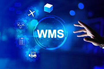 warehouse management system WMS concept with hand reach out to touch the system icon manage a storage and transportation process and transit technology