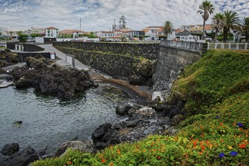 Picturesque view of the harbour with colourful flowers of the island capital Madalena, Madalena, Pico, Azores, Portugal