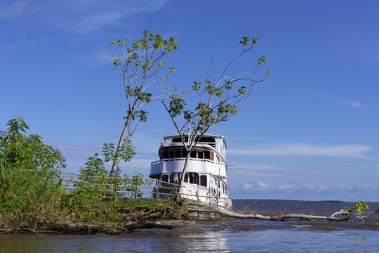 Traditional wooden boat anchored in the Itapicuru laguna, Para state, Brazil