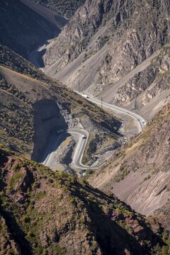 Koshoy Ata mountain pass, serpentine road through mountains, Kyrgyzstan