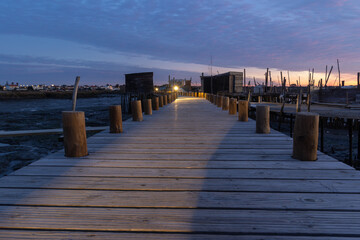 Carrasqueira palafitic port wooden pier at dusk