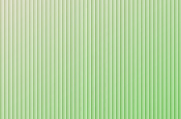 Fototapeta premium A light green background with thin vertical lines running from top to bottom in a subtle gradient effect