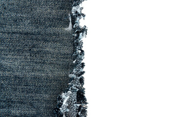 Piece of torn denim on a white background. Denim texture