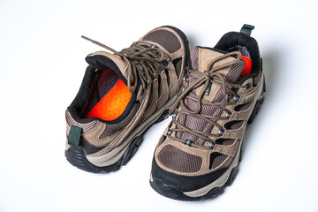 Sturdy brown sports footwear designed for rugged mountain adventures and professional outdoor photography