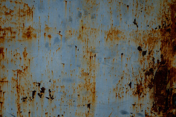 Old steel sheet and rusty surface. To remove the rust, use a wire brush, sandpaper or a scraper....