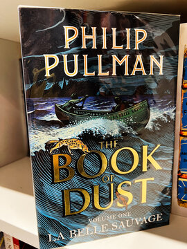 The Book of Dust La Belle Sauvage by Philip Pullman on a Bookshelf