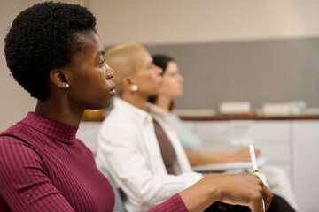 Diverse students learning in a university classroom