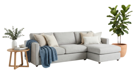 Modern light gray sectional sofa with chaise lounge blue knitted blanket and throw pillows studio shot cutout