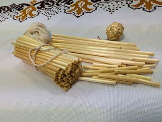 Natural straw tubes made from real straw, used for traditional Christmas decorations and ornaments.