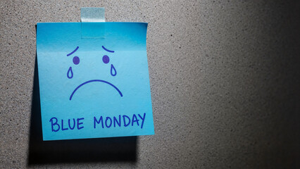 Sad face sticky note, emotional representation of Blue Monday feelings, copy space