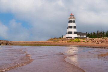 West Point Lighthouse and beach in rural Prince Edward Island, Canada.