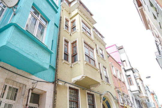 Beautiful view of colorful and tall residential buildings in Balat, Istanbul, T&uuml;rkiye.