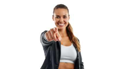 A smiling woman in athletic wear pointing forward on